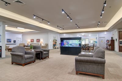 Common area with seating and fish tank