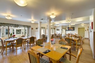 Dining area with tables set for meals
