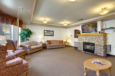 Cozy common area with seating and fireplace