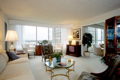 Bright, spacious interior living area with furniture