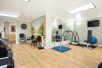 Interior view of a fitness area with exercise equipment