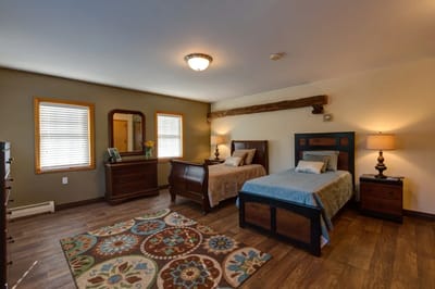 Cozy interior of a resident's room with two beds