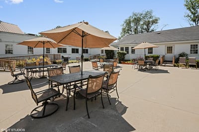 Outdoor seating area with umbrellas and tables