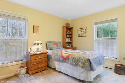 Cozy private resident room with a quilt