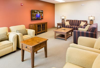 Cozy common area with seating and a television