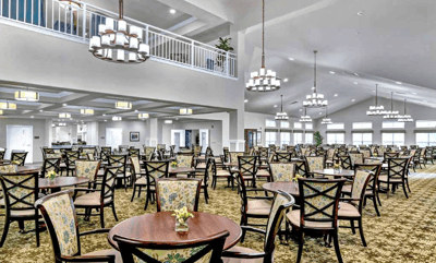 Bright dining area with tables and chairs