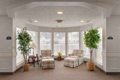 Bright common area with seating and plants