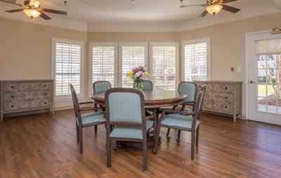 Common area featuring a round table and chairs