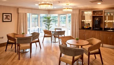 Dining area with wooden tables and modern decor