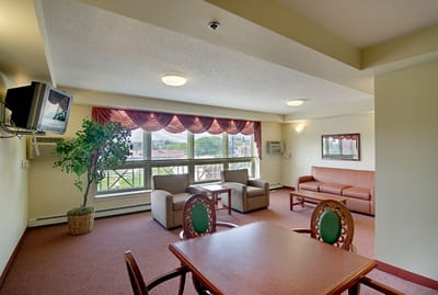 Common area with seating and large windows