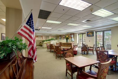Interior view of a dining area with tables and chairs