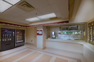 Interior view of a dining area with vending machines