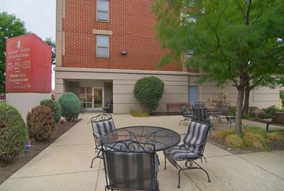 Outdoor seating area with tables and chairs