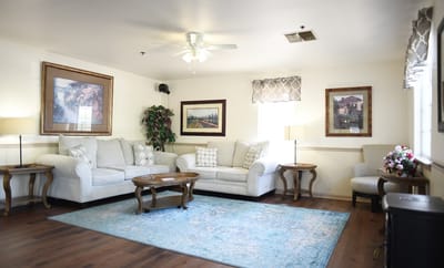 Bright common area with seating and artwork