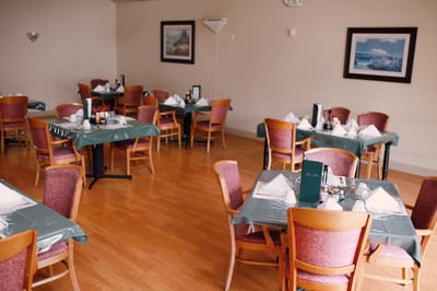 Dining area with tables set for meals