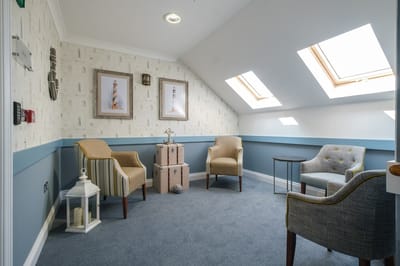 Cozy seating area with chairs and decorative elements