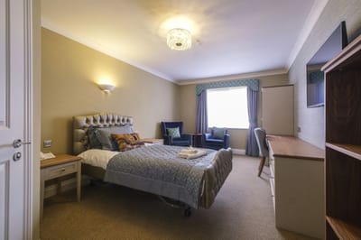 Well-furnished private resident room with a cozy atmosphere