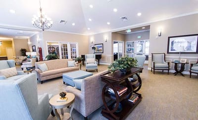 Bright common area with seating and natural light