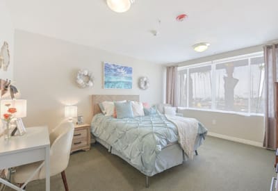 Bright, inviting private resident room with natural light