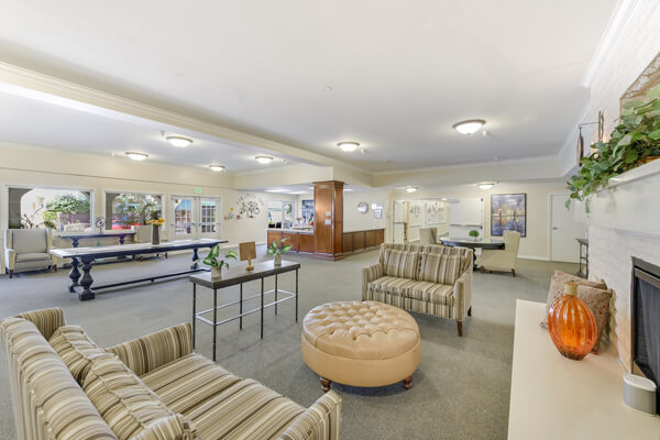 Bright common area with seating and natural light