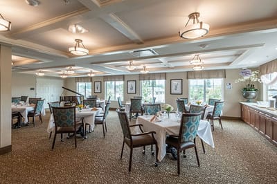 Bright dining room with elegant table settings