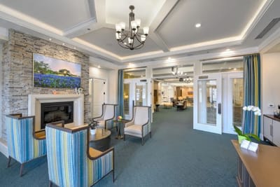 Bright common area with comfortable seating and decor