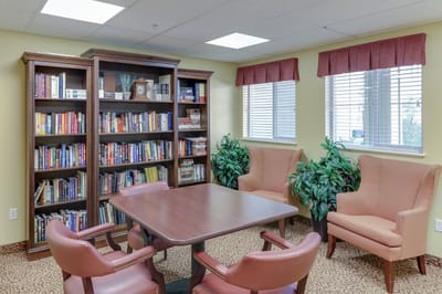 Cozy reading nook with bookshelves and comfortable seating