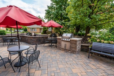 Outdoor patio area with tables and umbrellas