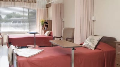 A shared bedroom in a senior living facility