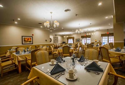 Dining area set for a meal with elegant decor