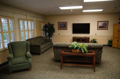 Cozy lounge area with seating and television