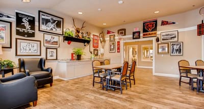 Common area with seating and sports memorabilia