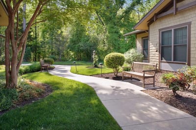 Well-maintained path through outdoor garden area