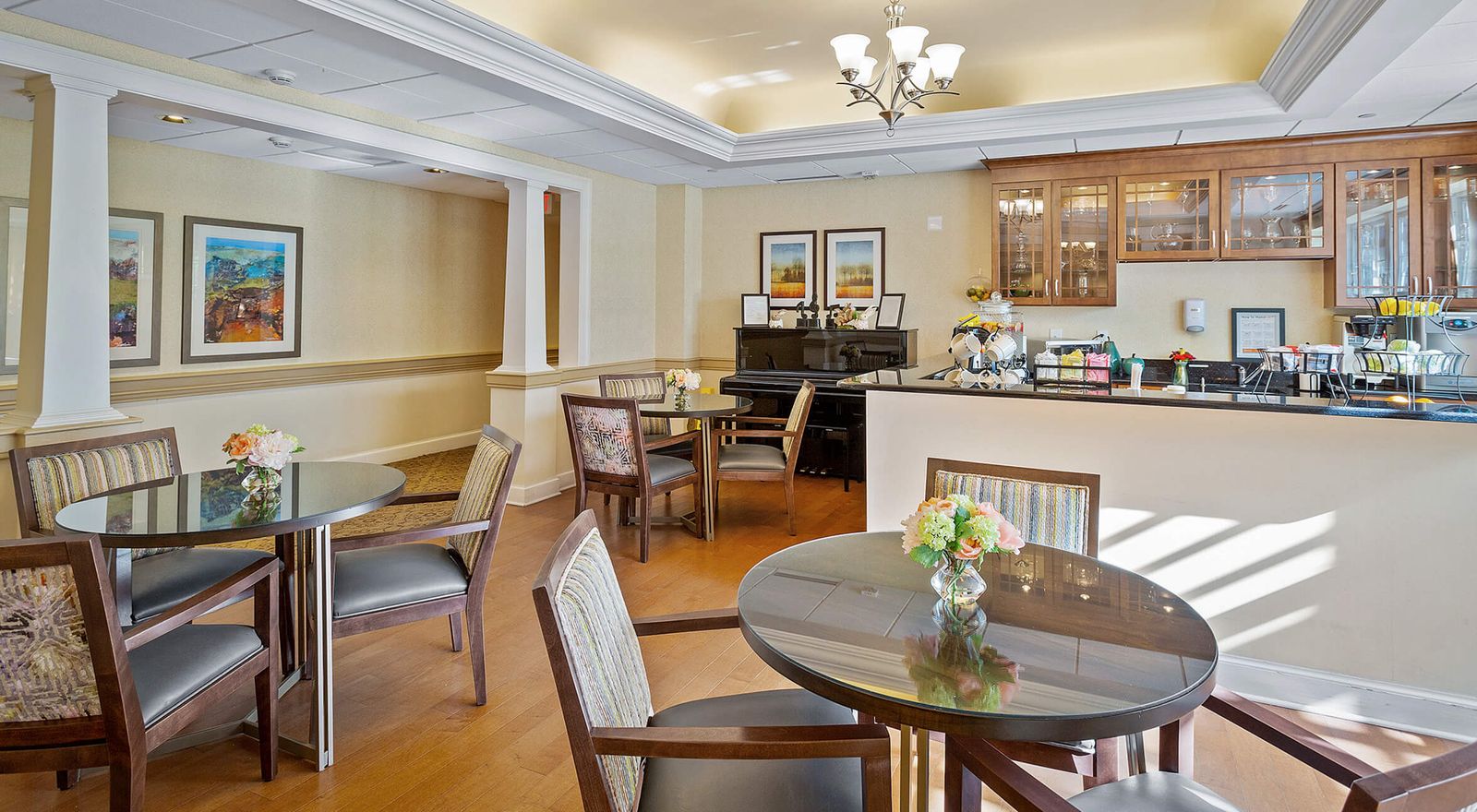 Common area with tables and piano