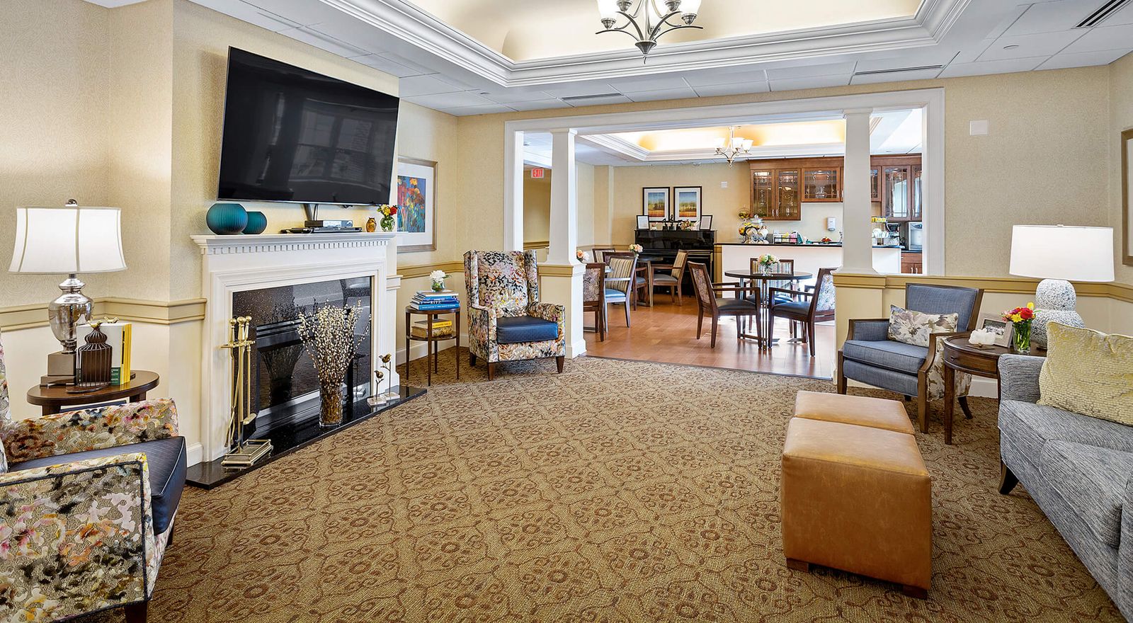 Cozy common area with comfortable seating and piano