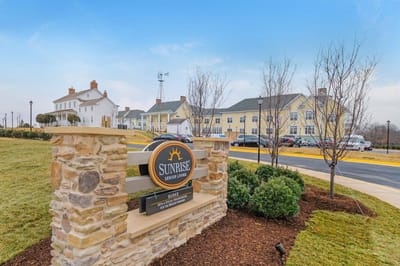 Facility logo at the entrance of Sunrise at Silas Burke House
