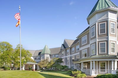 Building exterior with outdoor space and flags