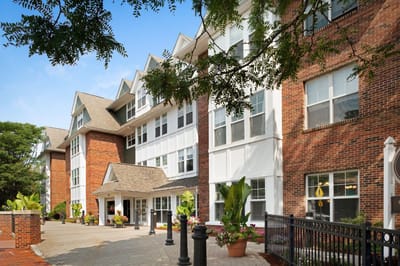 Exterior view of Sunrise of Arlington with landscaping