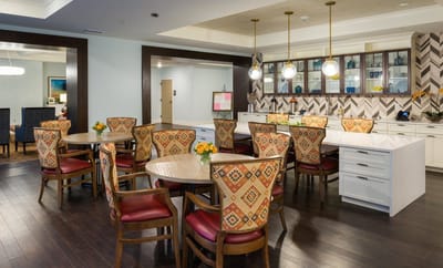 Bright common area with decorative dining tables