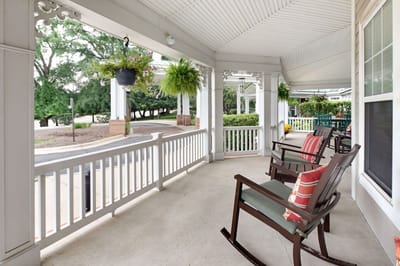 Outdoor seating area with rocking chairs on a porch