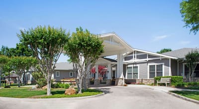 Exterior view of the facility entrance with landscaping
