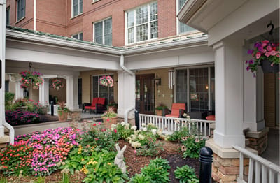 Colorful flowers and seating in a garden area