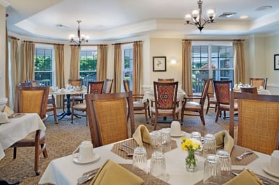 Elegant dining area with tables set for meals