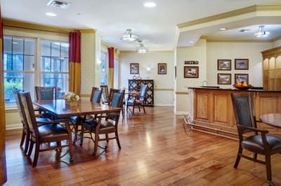 Interior view of a dining area with wooden furniture