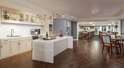 Modern dining room with a kitchen space and decorative lighting