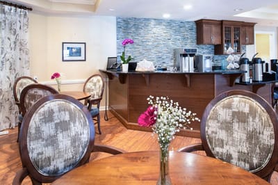 Bright common area with seating and decor