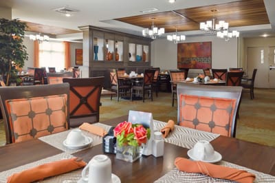 Dining room with neatly arranged tables and decor