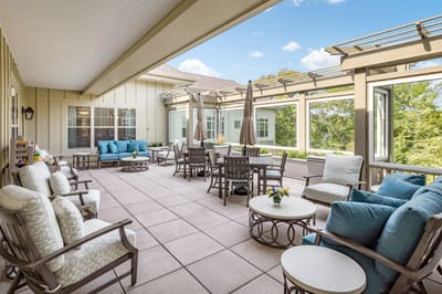 Outdoor patio area with seating and tables