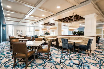 A beautifully decorated dining area with comfortable seating
