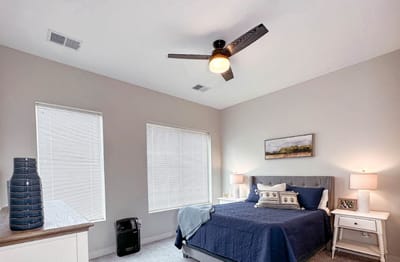 Cozy bedroom with natural light and modern decor